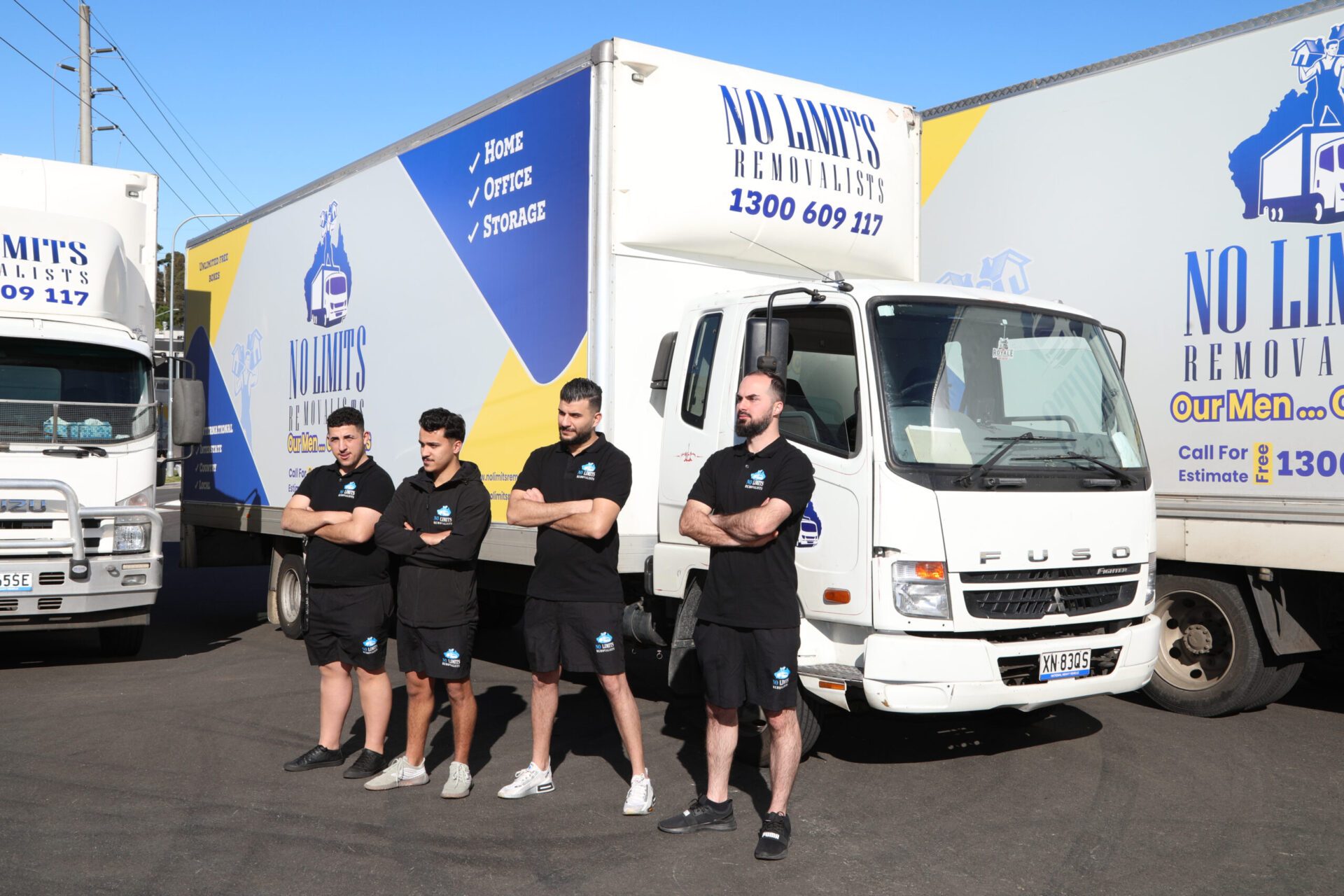 Crew beside a No Limits truck